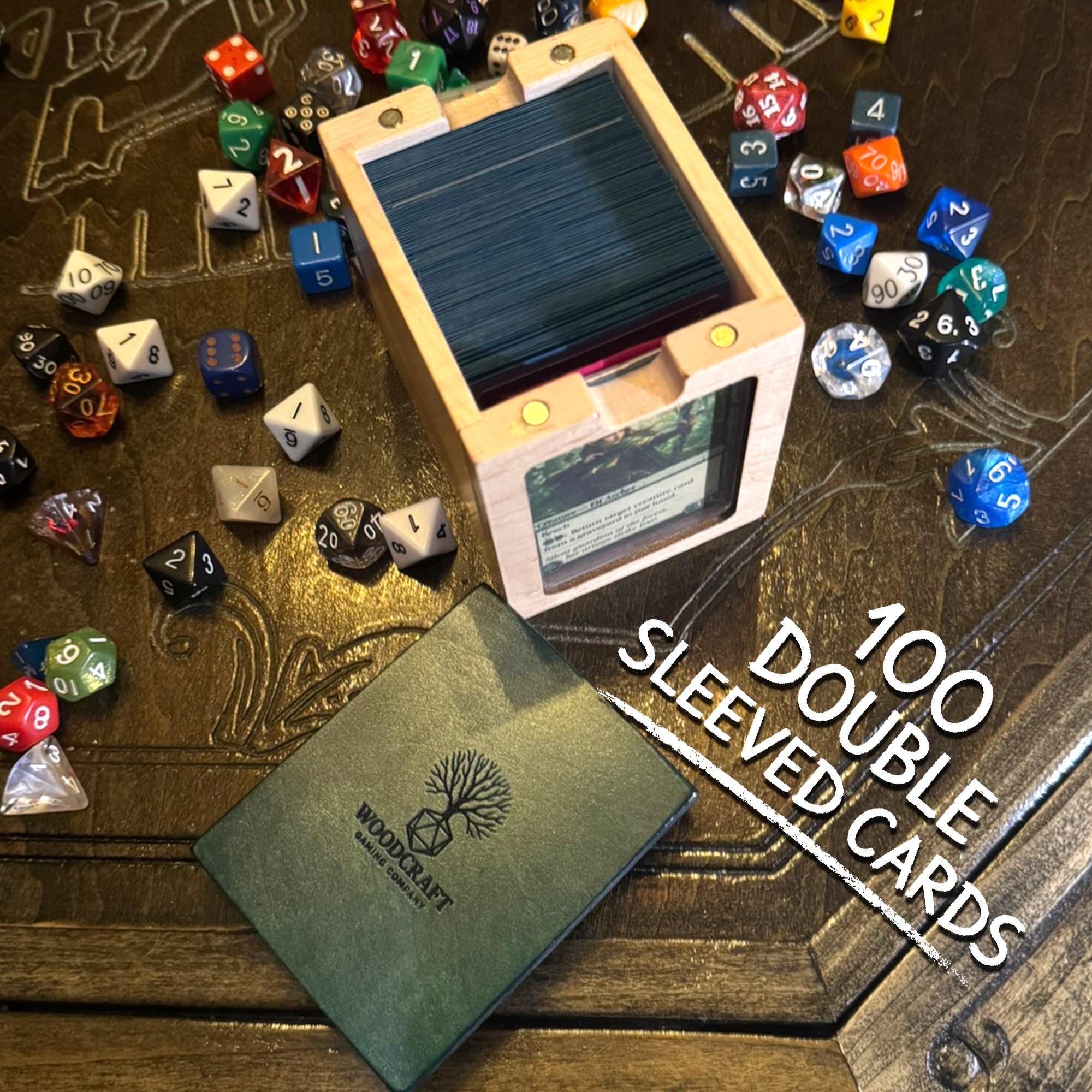 Deck box size reference next to sleeved trading cards
