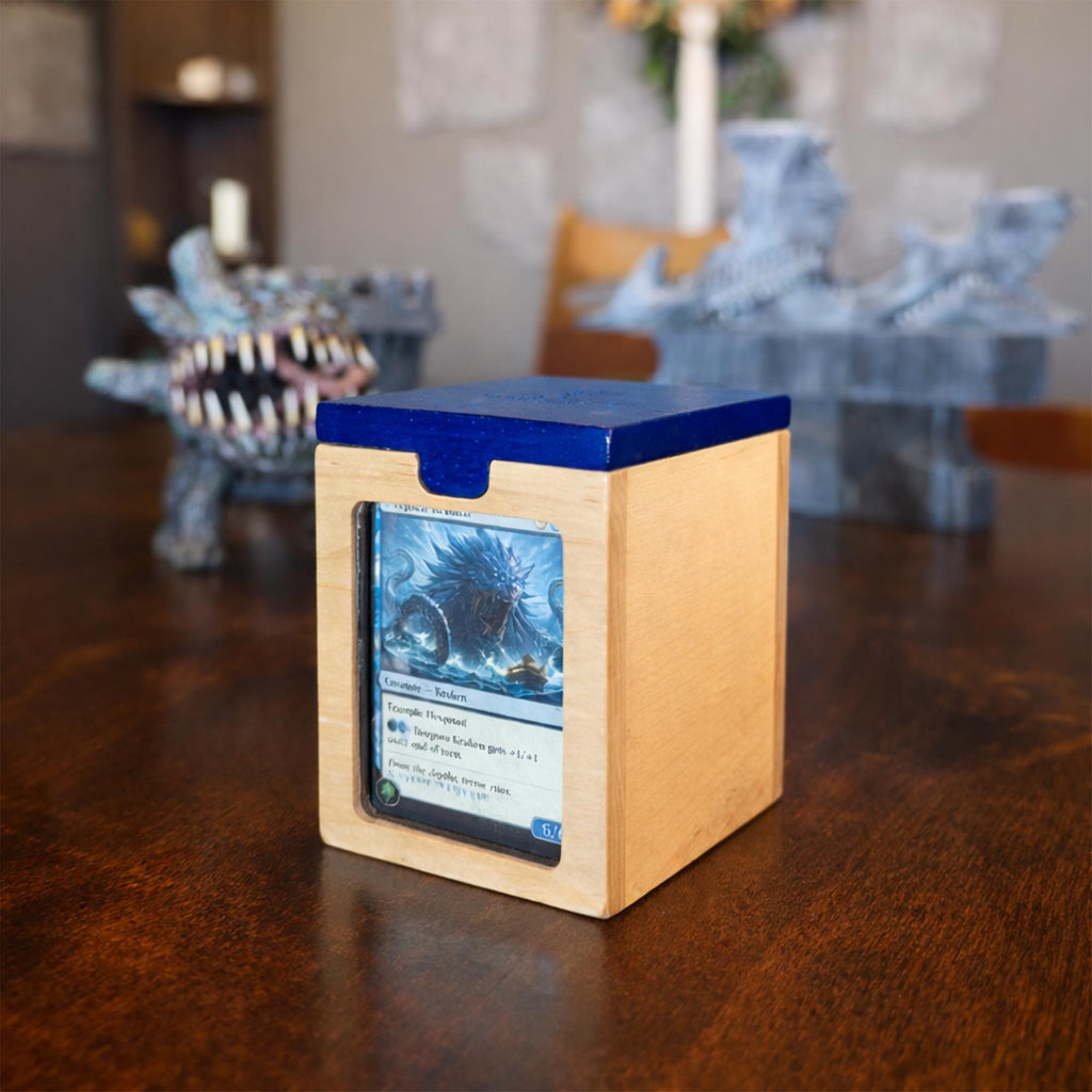 lose-up of clear acrylic display window on front of deck box

blue